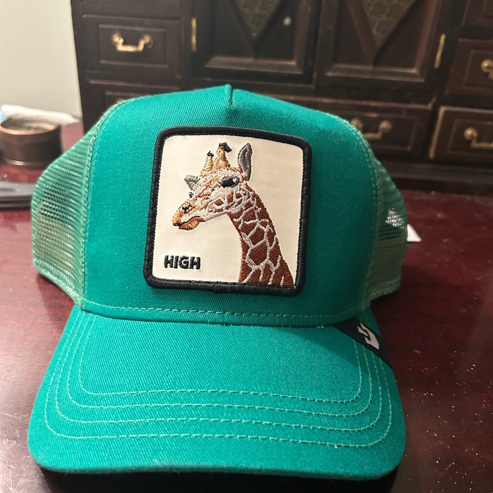 Goorin High Hat- New

Look high and mighty in our Giraffe trucker hat!